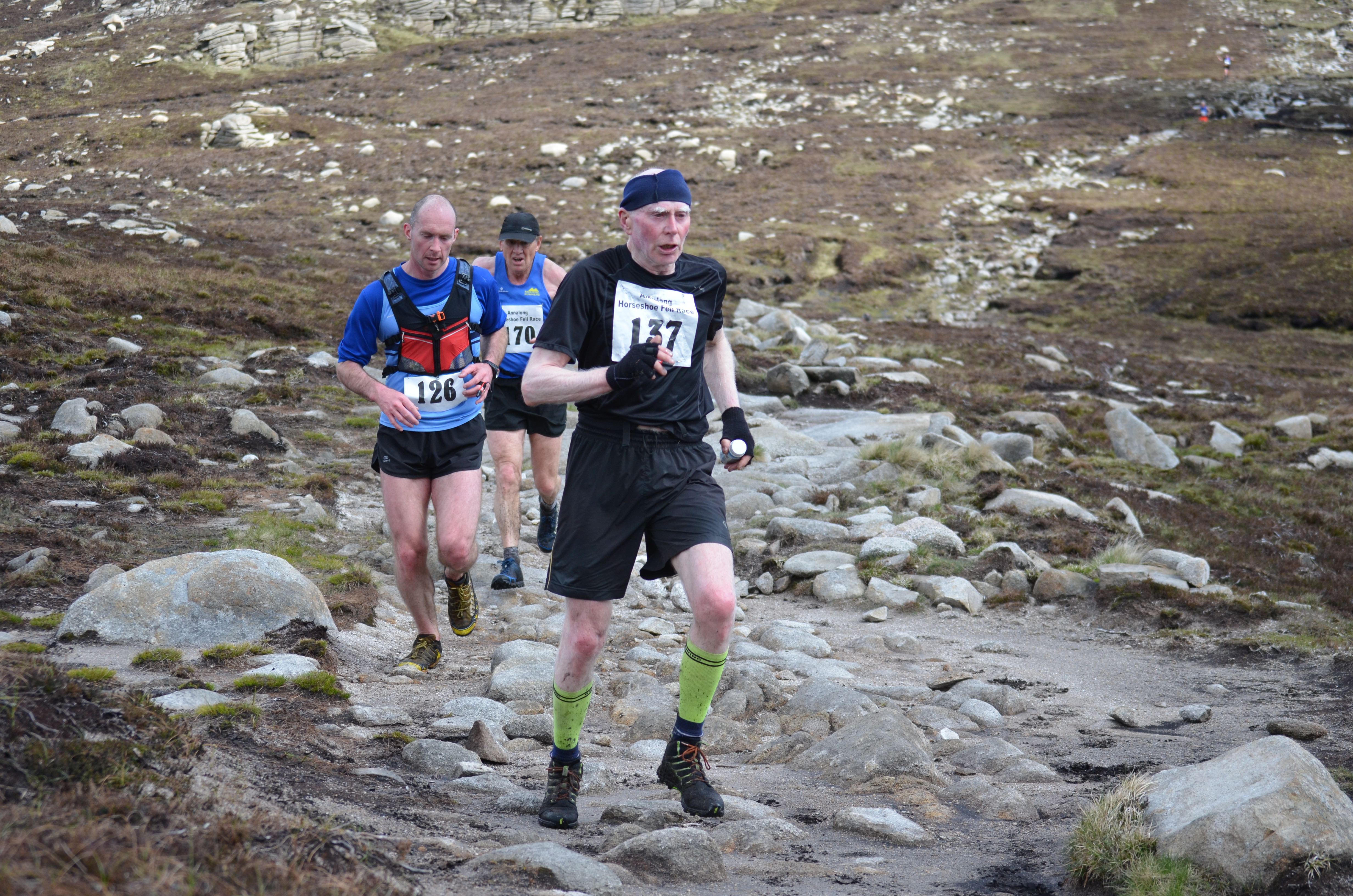 The race for first vet hots up with Jim Patterson (front) beating Stewart Cunningham (back)